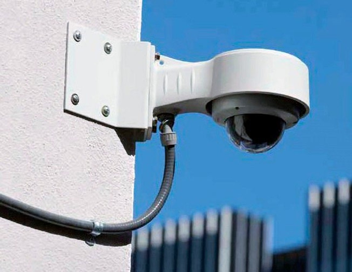 maintenance video camera on building wall