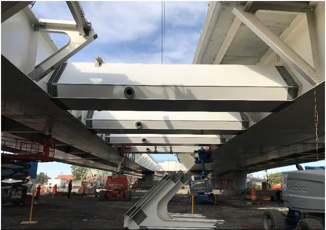Tie beams being erected to receive the stay cables for the Canal Lachine Bridge